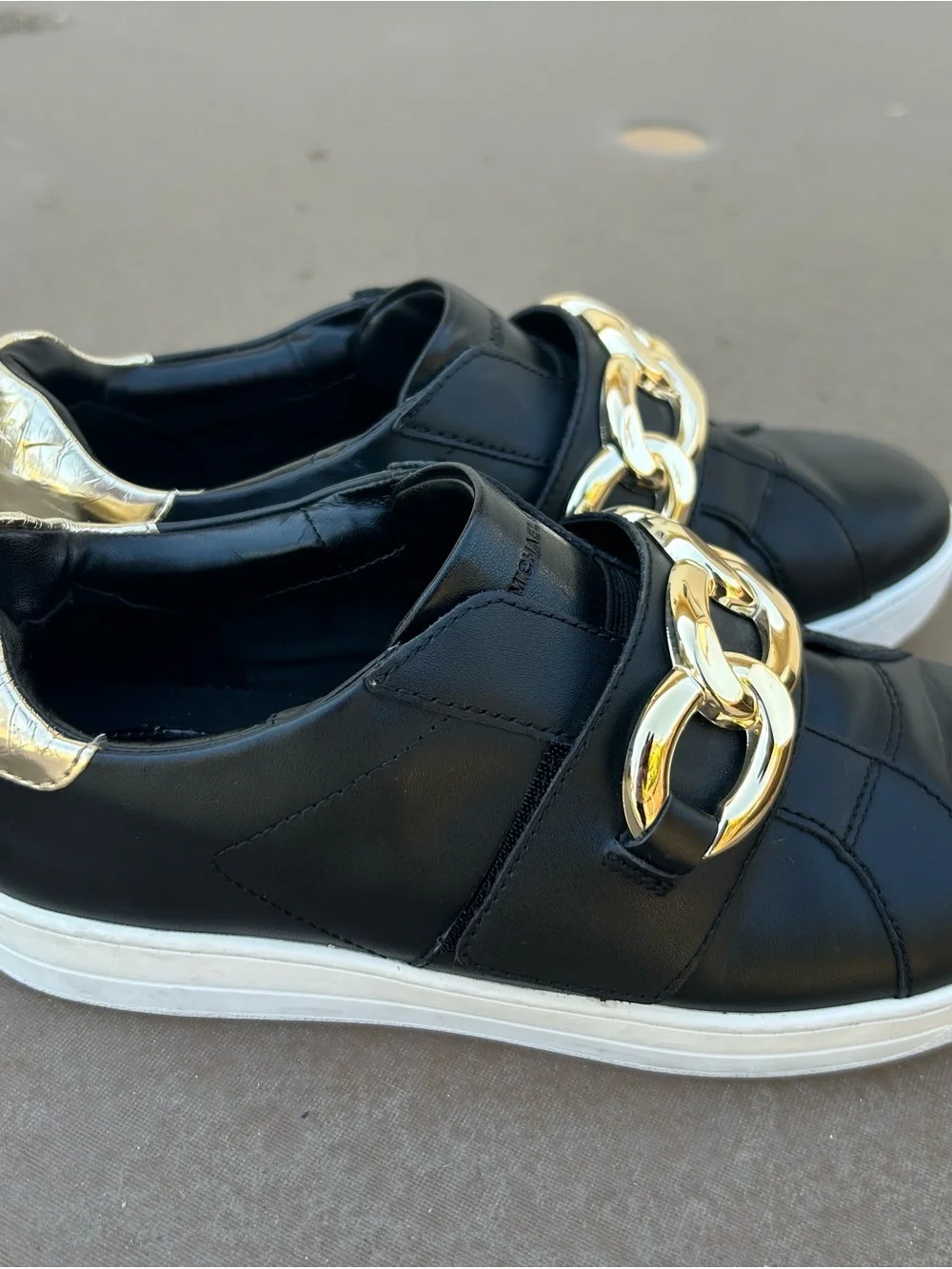 Michael Kors Kenna Black Leather Slip-On Sneakers with Gold Chain Accent Sz 8.5